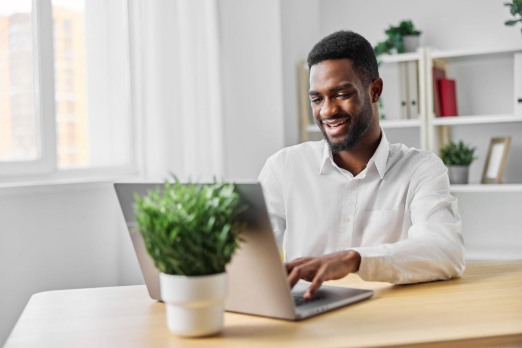 man student office cyberspace african computer freelancer job laptop education american online